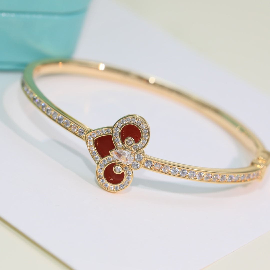 Tiffany Fleur De Lis Bracelet - 18K Yellow Gold