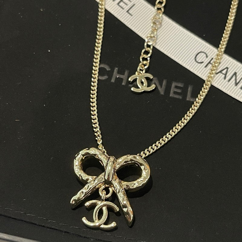 Chanel Gold Bow Tie Necklace