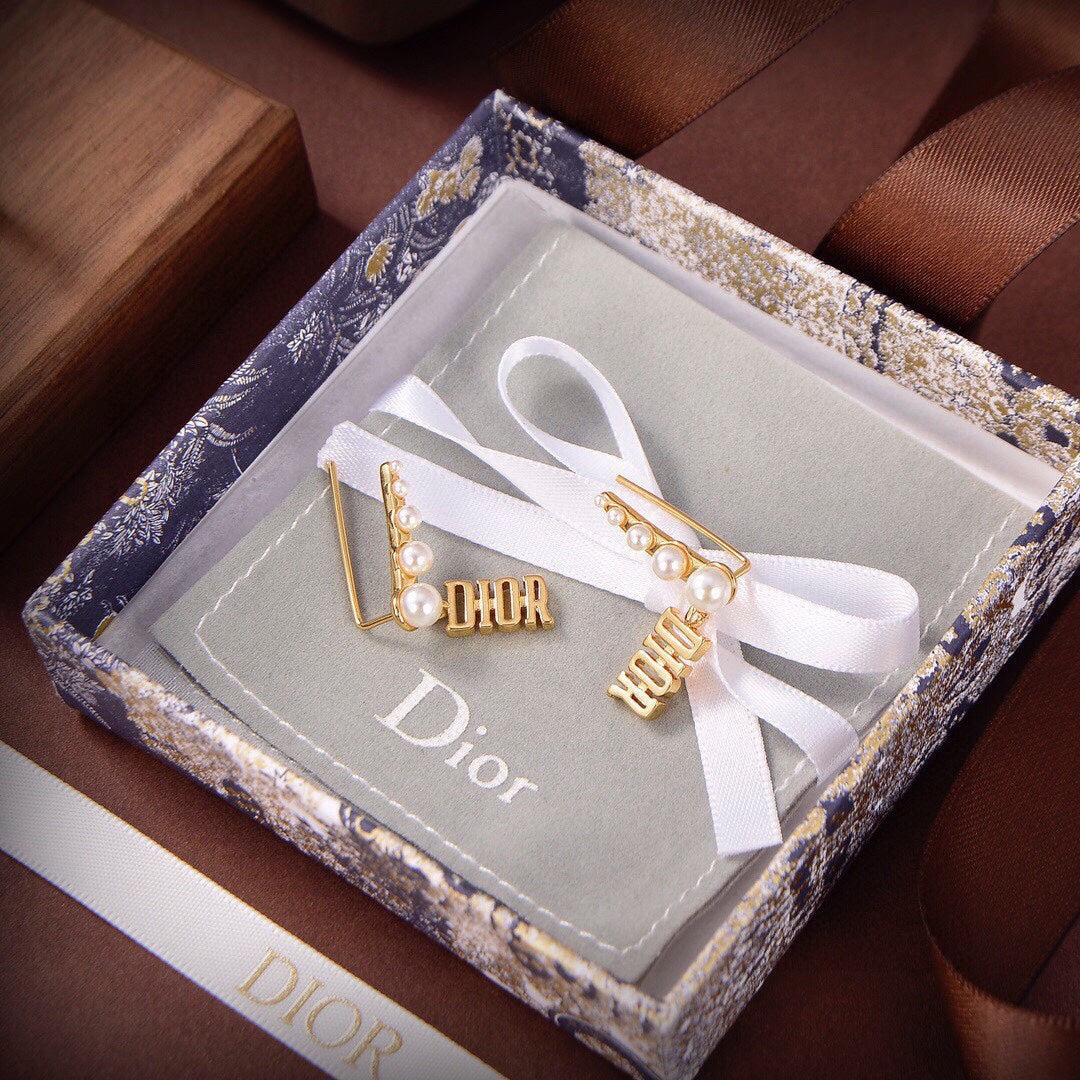Dior Revolution Resin Pearl Earrings