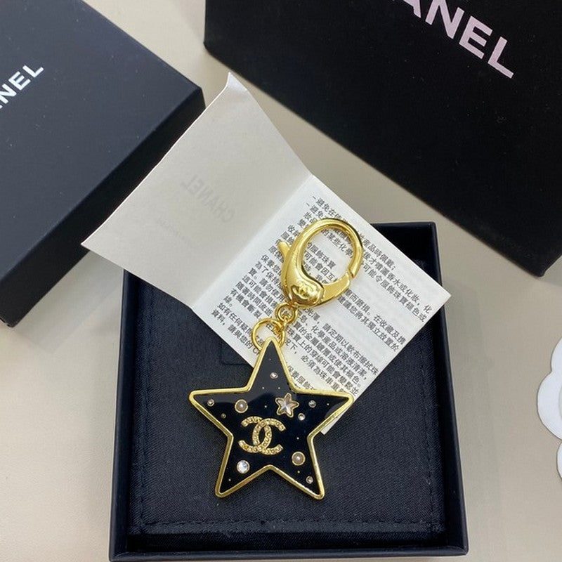 Chanel Black Gold Star Brooch