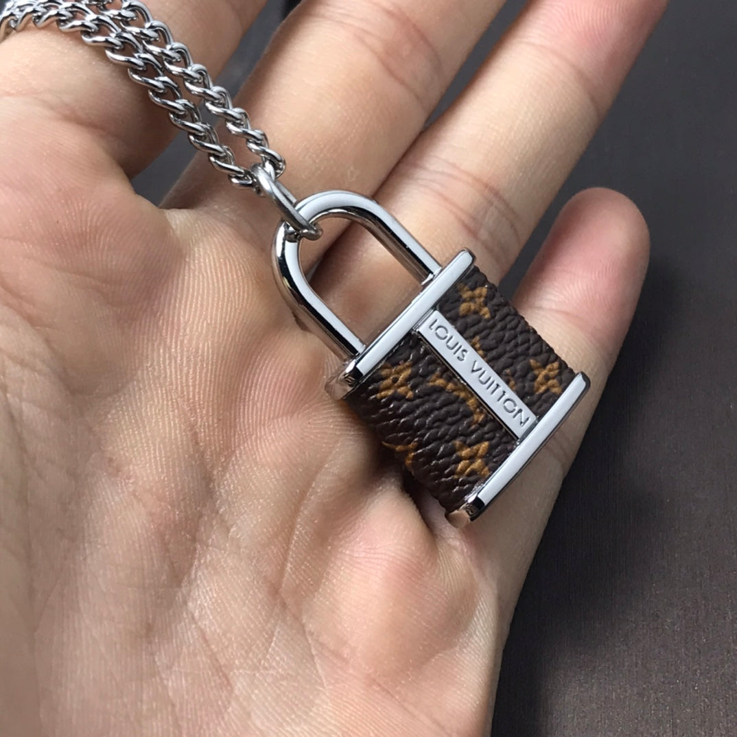 Louis Vuitton Monogram Lock Pendant Necklace