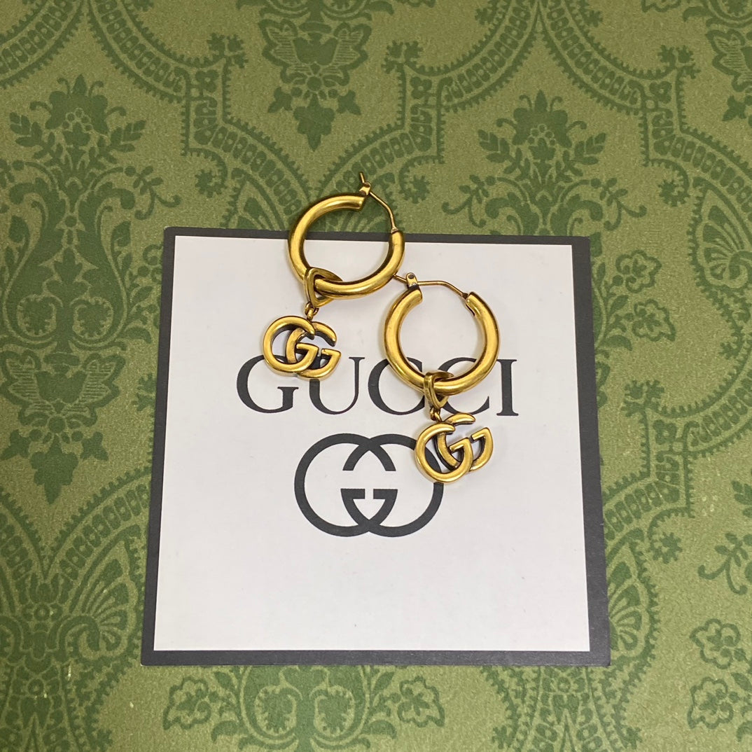 Gucci Double G Hollow Earrings - 18K Yellow Gold