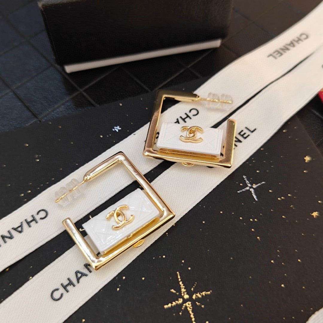 Chanel White Bag Hoop Earrings - 18K Yellow Gold