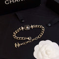 Chanel Black Logo Gold Chain Bracelet