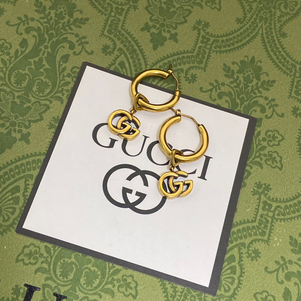 Gucci Double G Hollow Earrings - 18K Yellow Gold