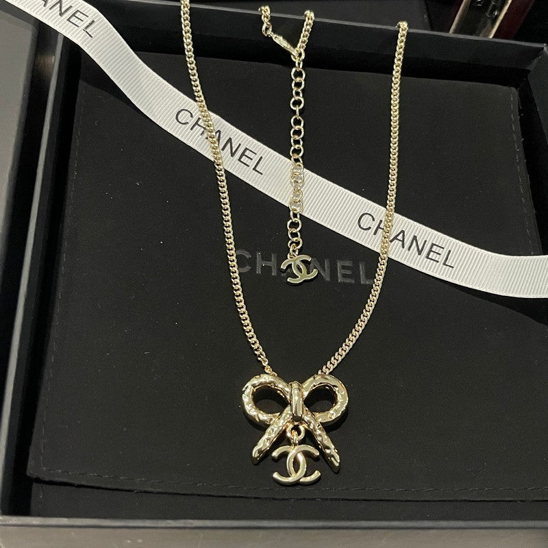 Chanel Gold Bow Tie Necklace