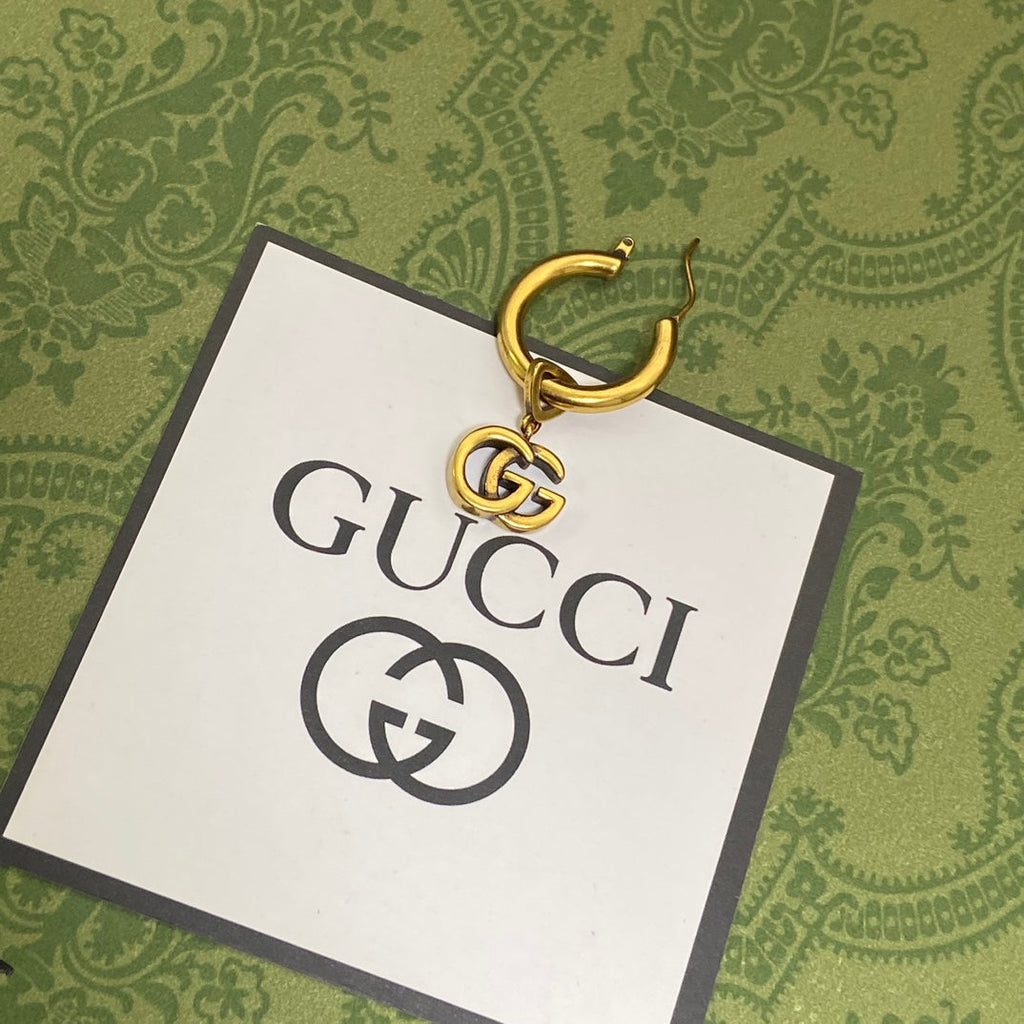 Gucci Double G Hollow Earrings - 18K Yellow Gold