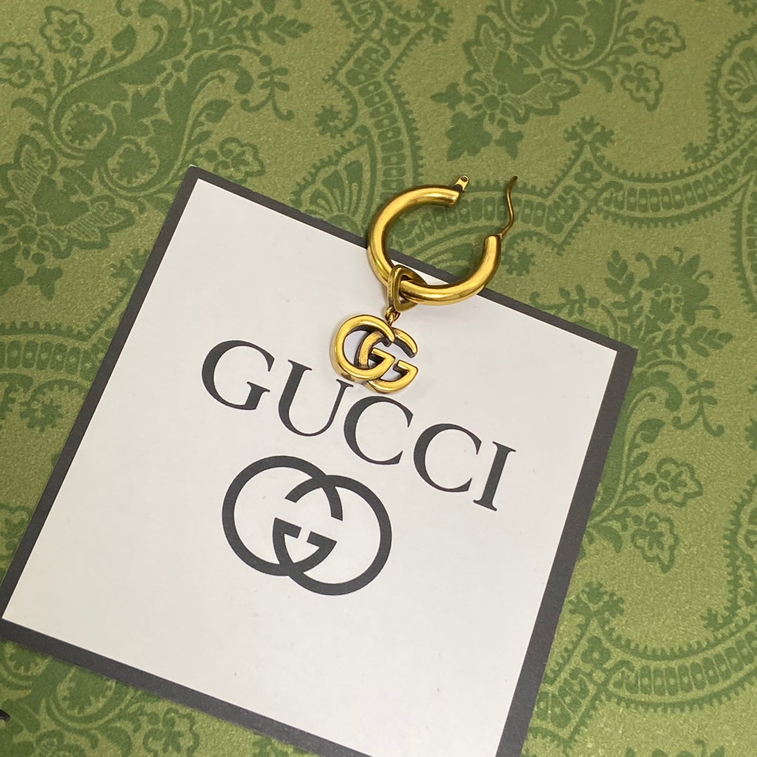 Gucci Double G Hollow Earrings - 18K Yellow Gold