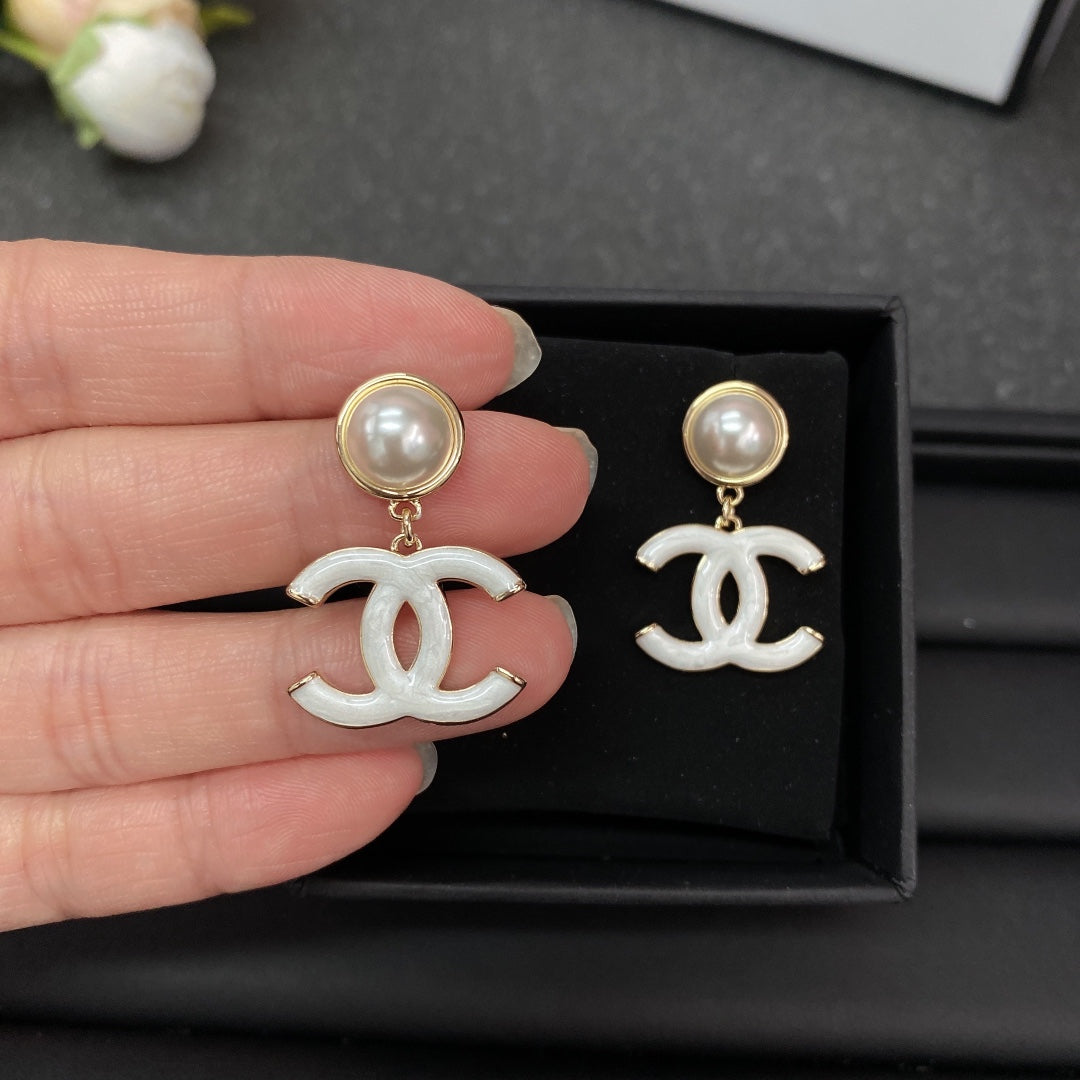 Chanel White Pearl Earrings - 18K Yellow Gold