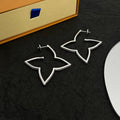 Louis Vuitton Debuts Blossom Earrings - 18K White Gold