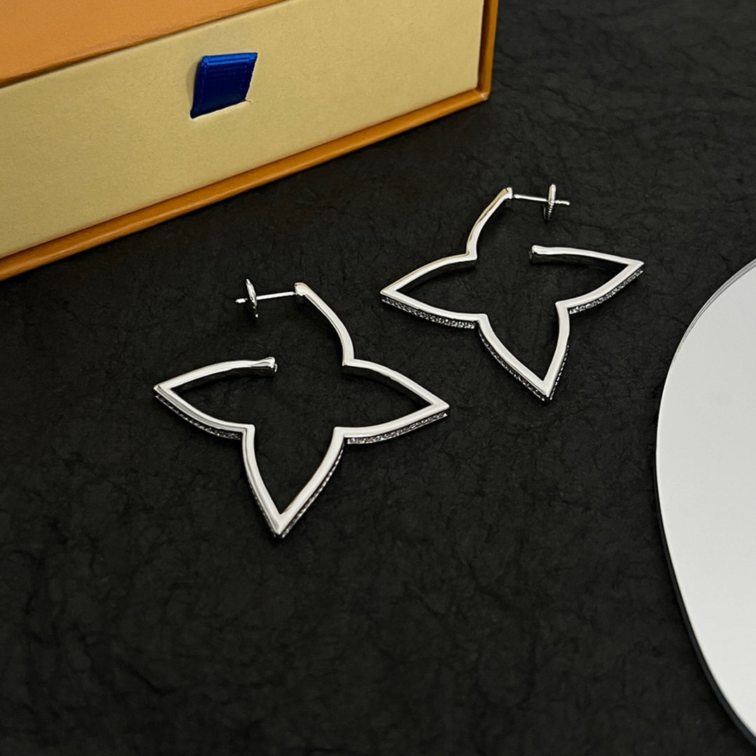 Louis Vuitton Debuts Blossom Earrings - 18K White Gold