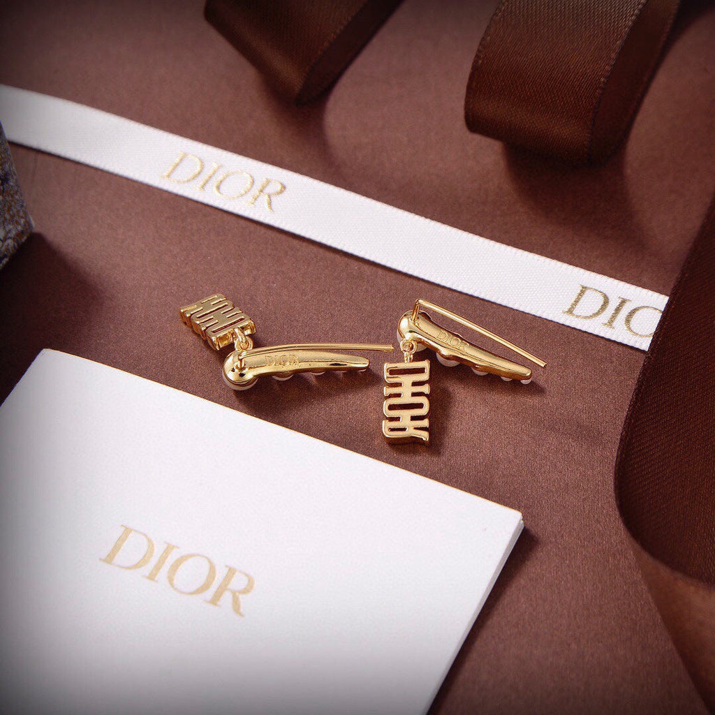 Dior Revolution Resin Pearl Earrings