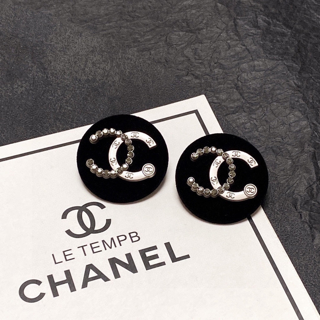 Chanel Black Resin Circle Earrings - 18K Yellow Gold