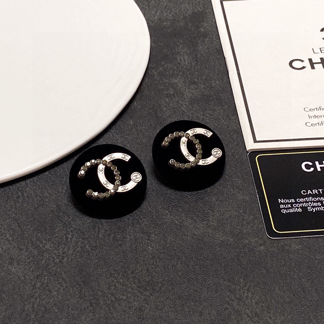 Chanel Black Resin Circle Earrings - 18K Yellow Gold