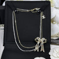 Chanel 25K Bow Tie Diamond Gold Necklace
