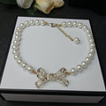 Chanel Bow Pearl Necklace