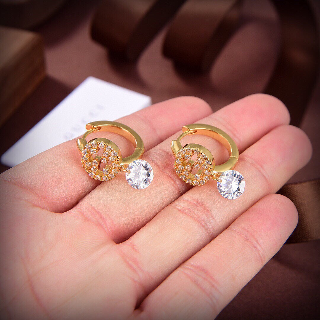 Gucci Double G Interlocking G Diamond Earrings - 18K Yellow Gold