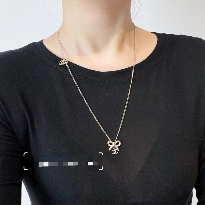 Chanel Gold Bow Tie Necklace