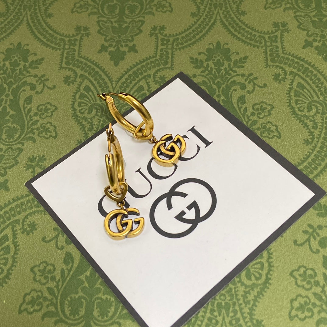 Gucci Double G Hollow Earrings - 18K Yellow Gold