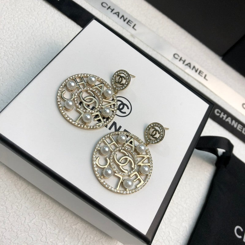 Chanel Circle Pearl Pendant Earrings - 18K Yellow Gold