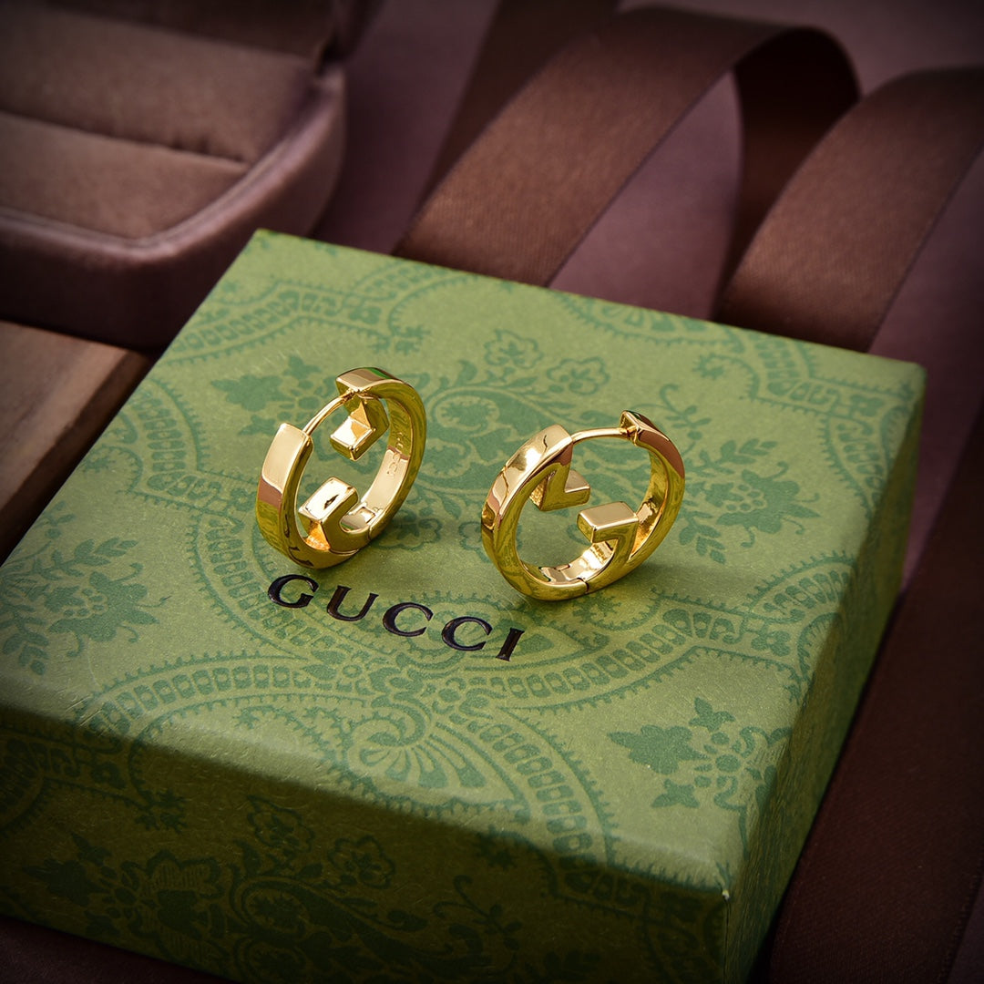 Gucci Double G Hollow Earrings - 18K Yellow Gold
