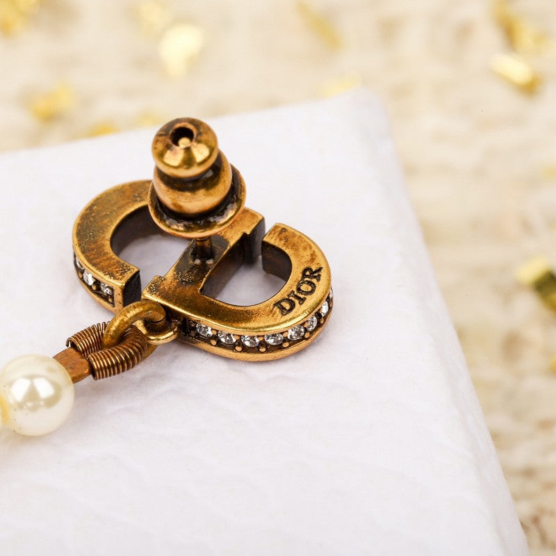Dior Long Pearl Earrings - 18K Yellow Gold