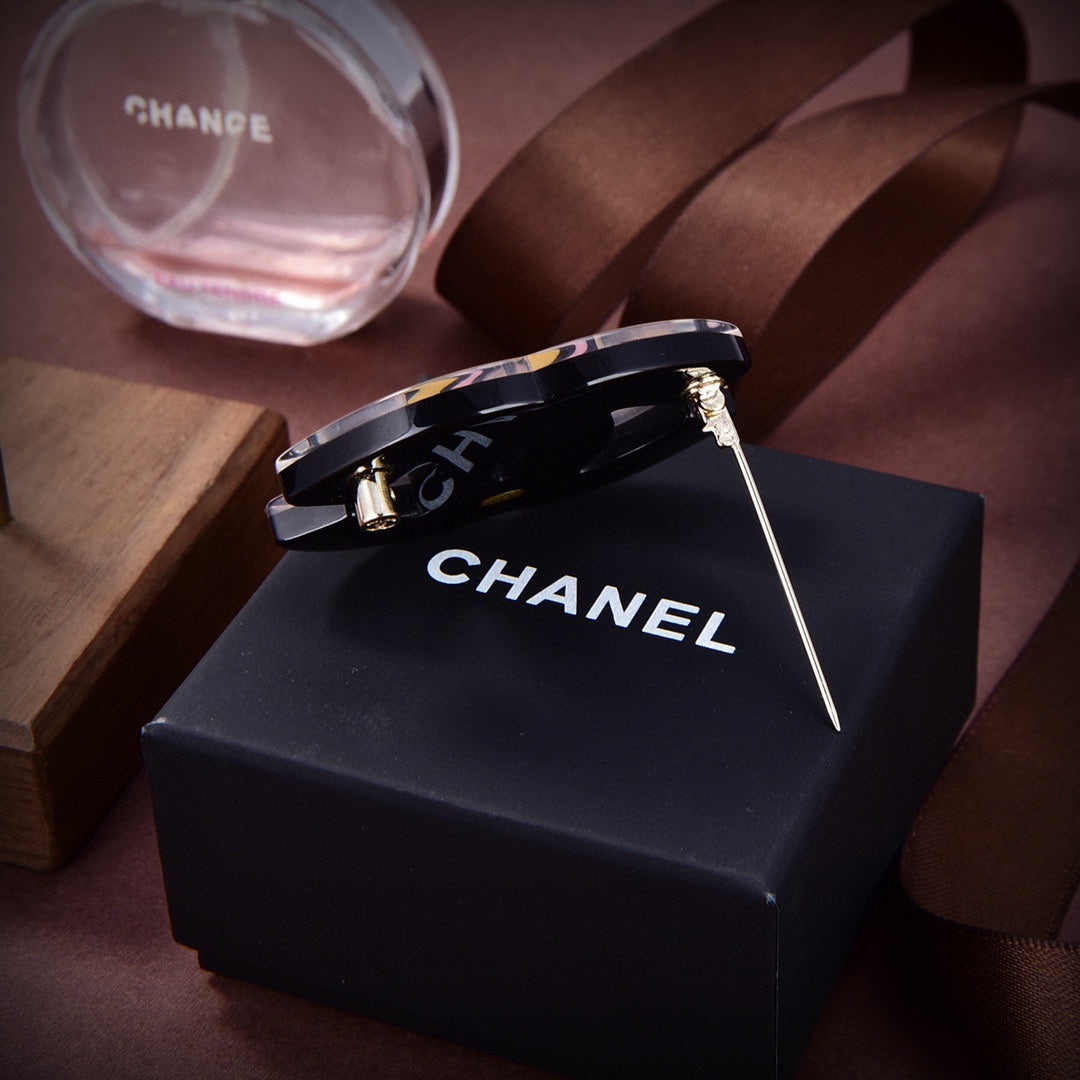 Chanel Yellow Brooch