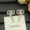 Chanel Butterfly Pearl Earrings - 18K Yellow Gold