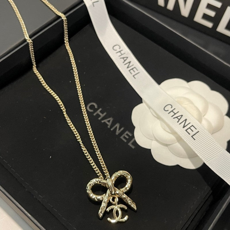 Chanel Gold Bow Tie Necklace
