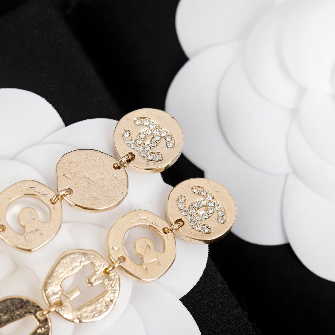 Chanel Script Pendant Earrings - 18K Yellow Gold