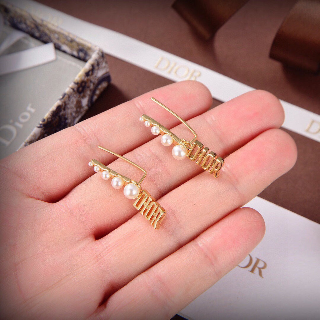 Dior Revolution Resin Pearl Earrings