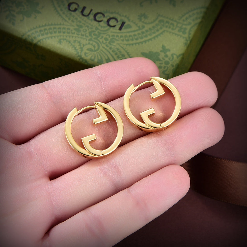 Gucci Double G Hollow Earrings - 18K Yellow Gold