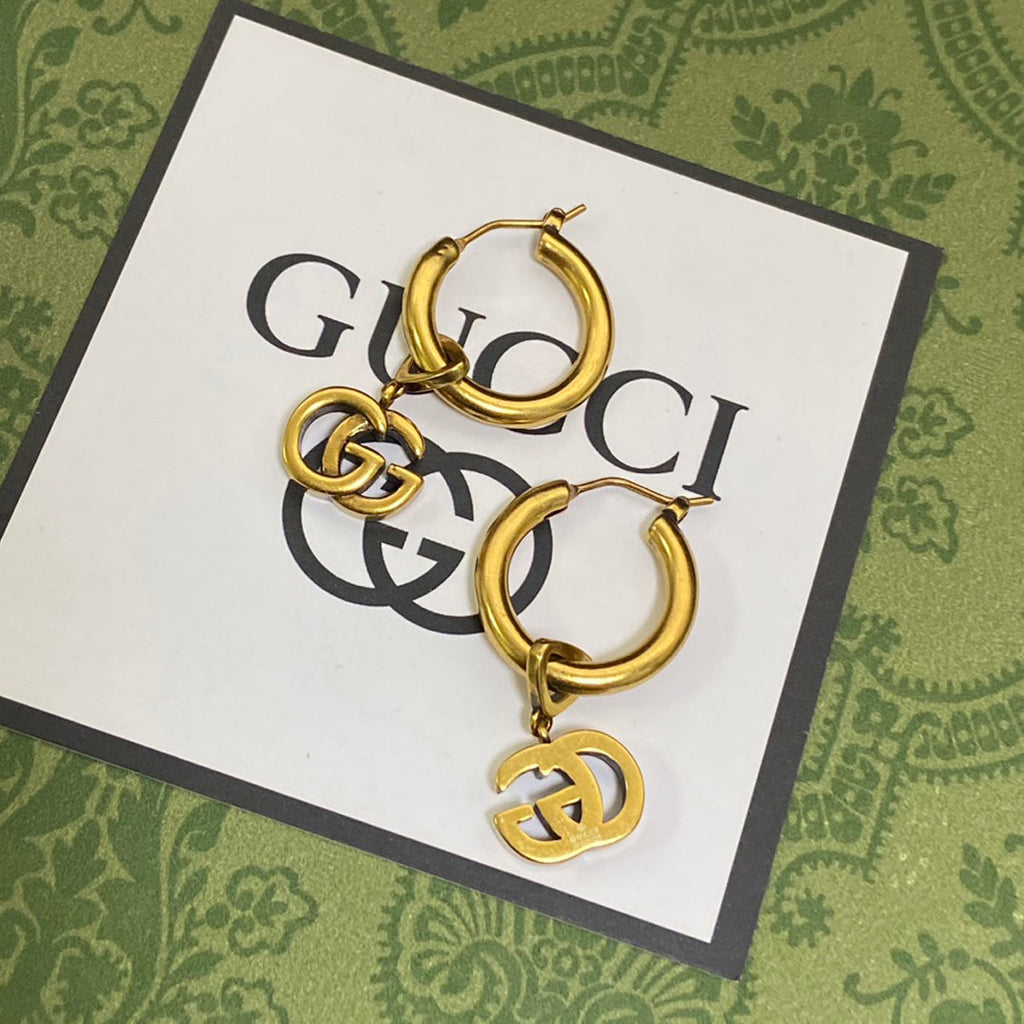 Gucci Double G Hollow Earrings - 18K Yellow Gold