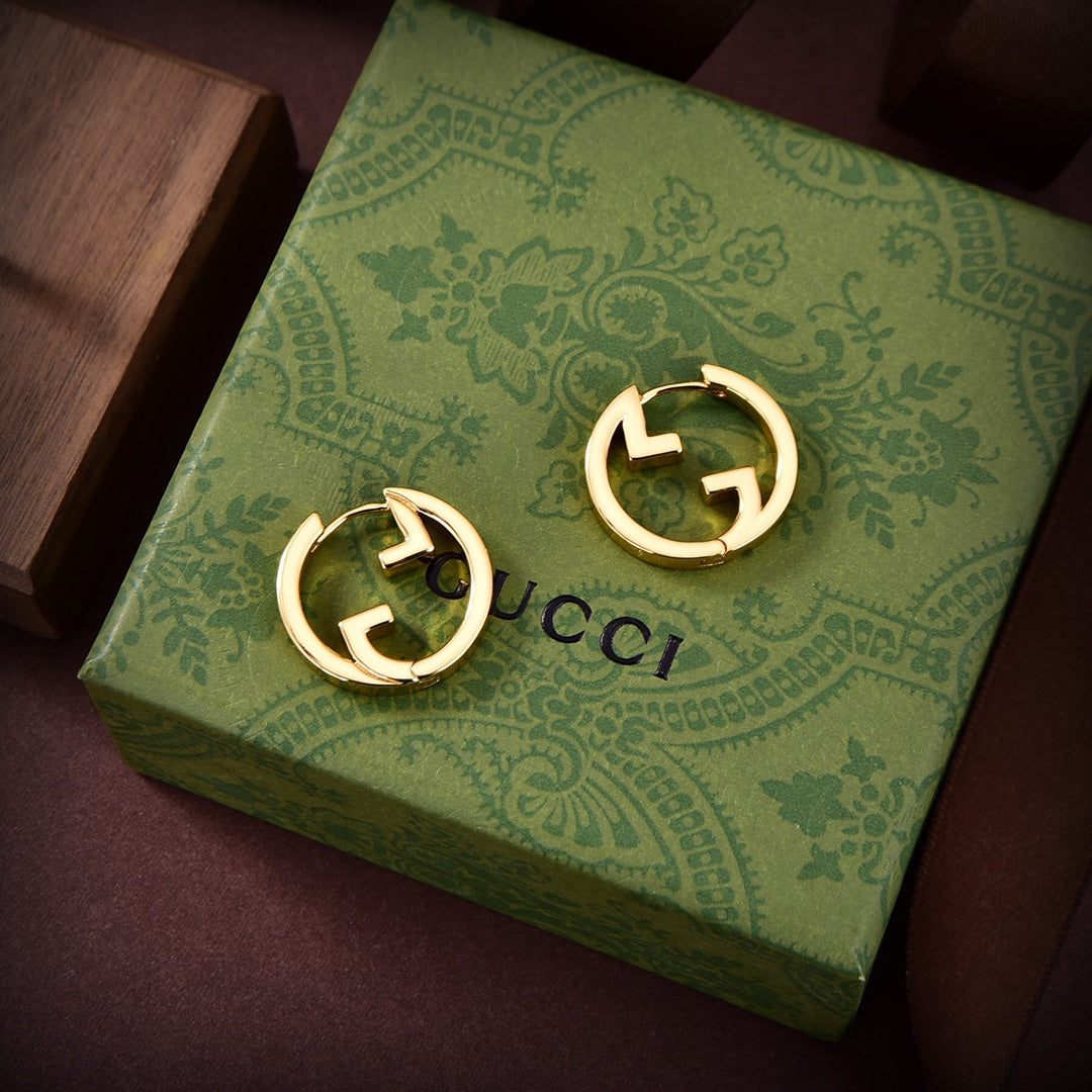 Gucci Double G Hollow Earrings - 18K Yellow Gold