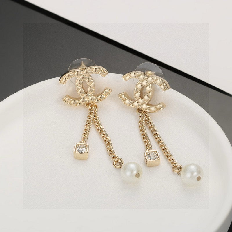 Chanel Long Pearl Pendant Earrings - 18K Yellow Gold