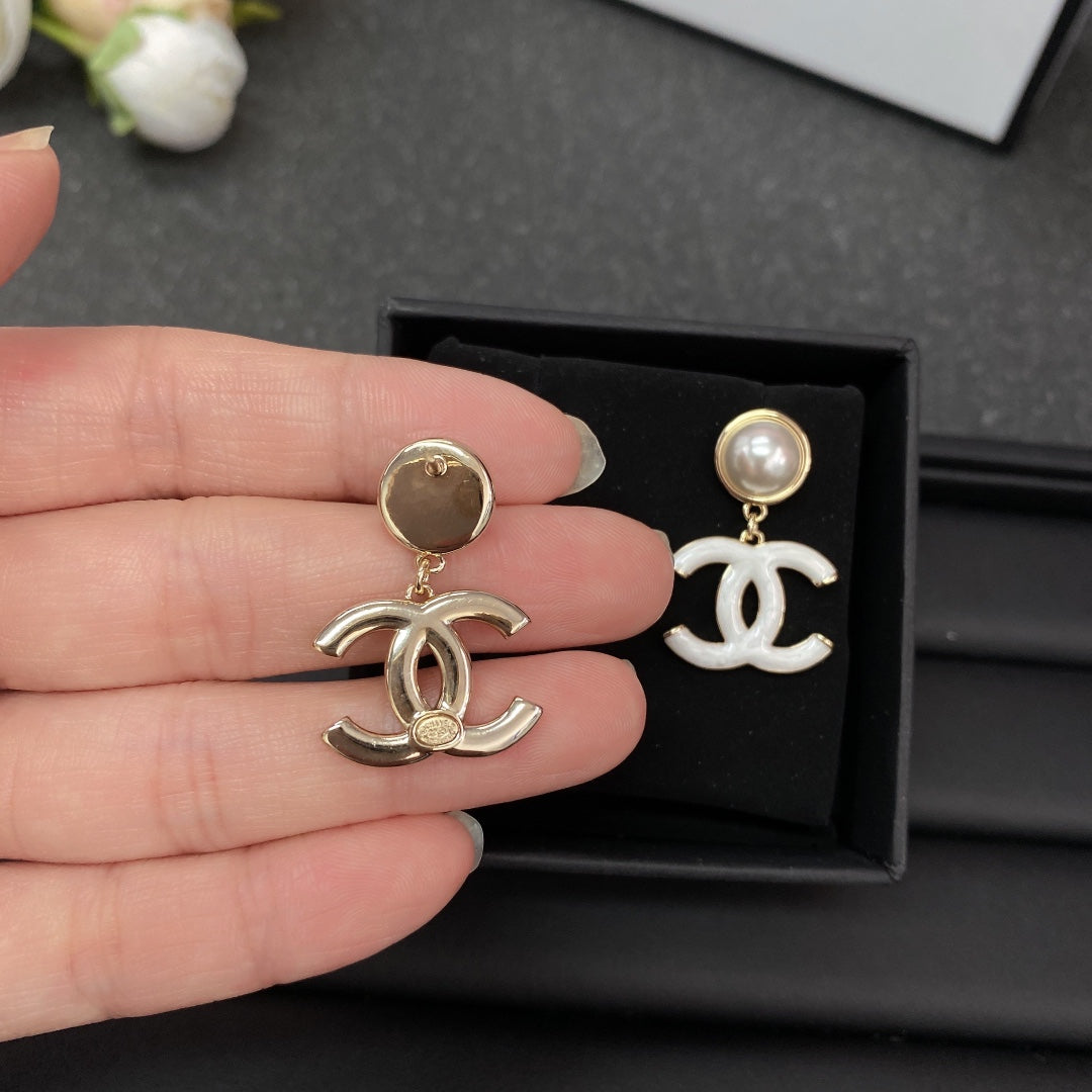 Chanel White Pearl Earrings - 18K Yellow Gold