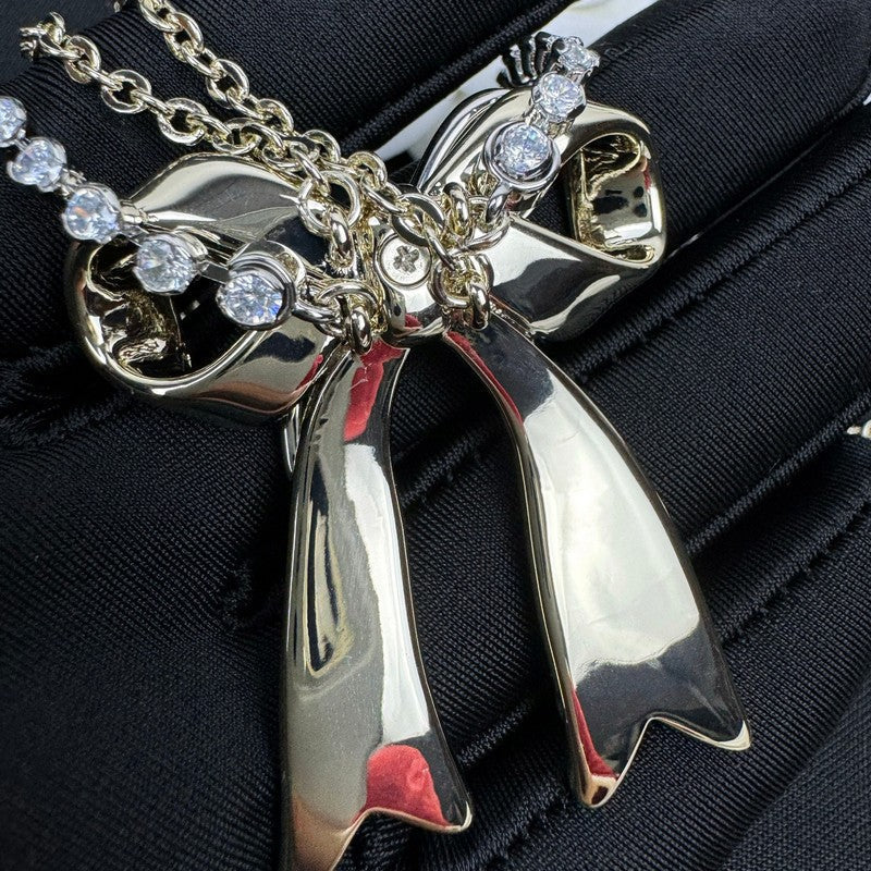 Chanel 25K Bow Tie Diamond Gold Necklace