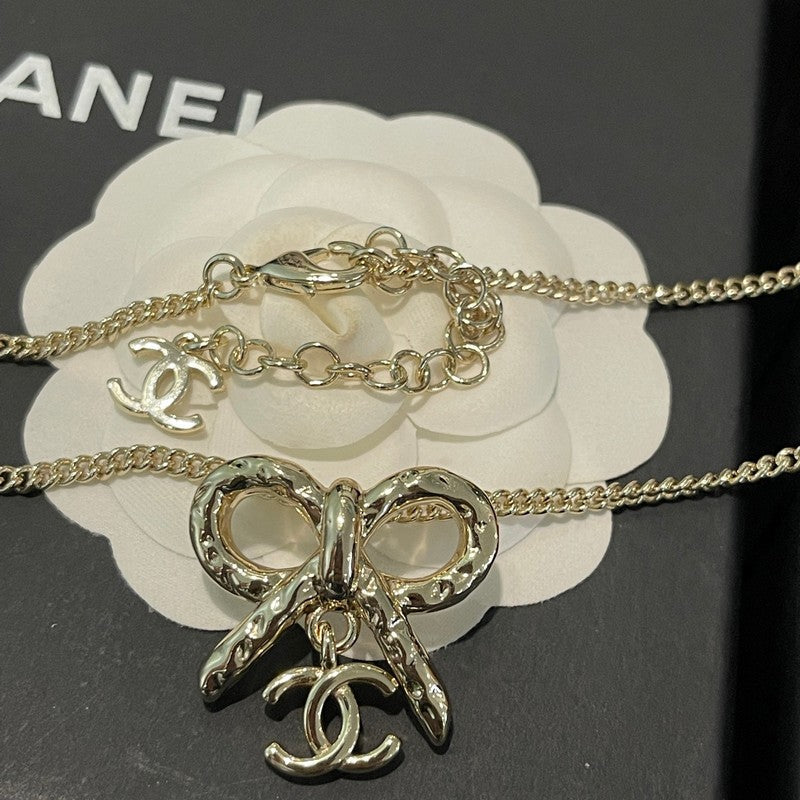 Chanel Gold Bow Tie Necklace