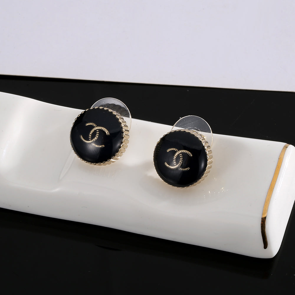 Chanel Circle Black Resin Earrings - 18K Yellow Gold