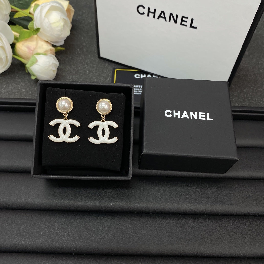 Chanel White Pearl Earrings - 18K Yellow Gold